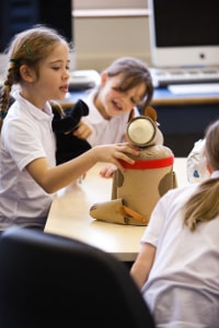 Students with educational toy